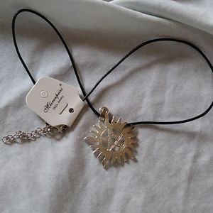 Sun and star pendant necklace